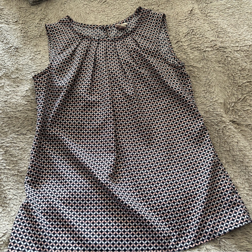 Pink, light blue, and navy patterned blouse. Size small.